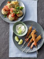 Breaded shrimp kebabs with dip and shrimp balls with tomato sauce