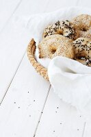 Assorted bagels in a bread basket