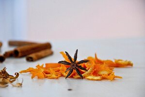 Assorted flavourings for mulled wine (orange peel, star anise, cinnamon sticks)