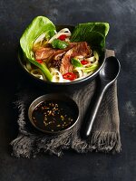 Noodle soup with beef and pak choi (Vietnam)