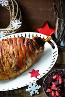 Baked ham glazed with cider for the Christmas celebration