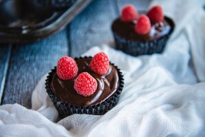 Chocolate Frosted Cupcakes with Raspberries