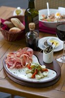 A selection of antipasti with red wine (Italy)