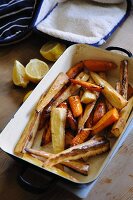 Roasted root vegetables in a roasting dish