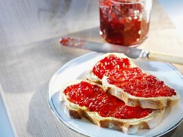 Two slices of bread spread with homemade jam
