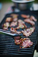 Marinated beef on a barbecue