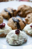 Cranberry biscuits with white and dark chocolate glaze