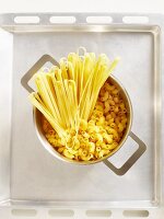 Uncooked pasta in a pan (seen above)