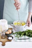 Gnocchi with saltbush being made