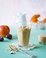 A breakfast smoothie made with dates, pears, apples, nuts and milk