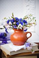 Spring posy of liverwort flowers, snowdrops & cherry blossom