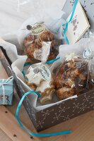 Homemade Christmas biscuits in cellophane bags as gifts