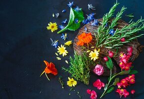 Various fresh herbs and edible flowers