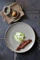 Pork neck, mashed potatoes with wild herbs and salt crust potatoes (a meal by the award-winning Flemish chef Kobe Desramaults)