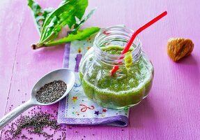 An apple and spinach smoothie with dates and dandelion leaves
