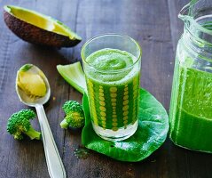 Avocado and fennel smoothie with broccoli, bok choy, green kale, black kale and cardamom