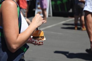 A woman at a food truck festival in California, USA