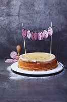 A garland made using a rubber stamp as a decoration idea for a cake