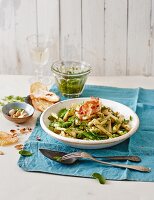 Pasta with pea and chervil pesto, pancetta and toast