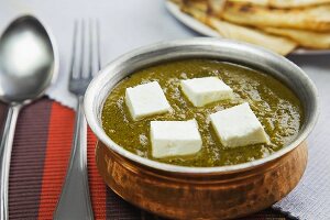 Palak paneer (spinach cream with cream cheese, India)