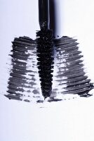 Black mascara on a white surface