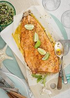 Oven roasted salmon fillet with pepper and limes