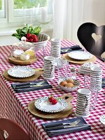 A table laid for supper with cheese, radishes and hard-boiled eggs