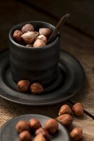 Hazelnuts and porcelain cup