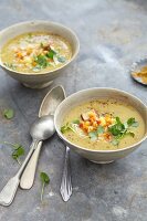 Red lentil soup with smoked tofu, potatoes and tomatoes