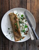 Wholemeal herb pancakes with may turnips and mange tout