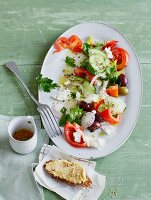Greek salad with pea cream crostini