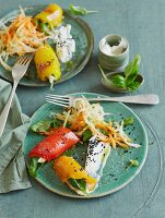 Raw white cabbage salad with stuffed peppers