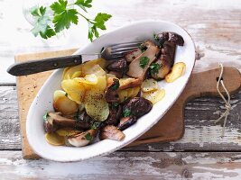 Fried potatoes with porcini mushrooms