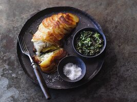 Fish fillet with potato soup and herb sauce