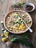 Diced potatoes and courgettes on a wholemeal tart base