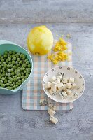 Ingredients for lemon risotto with peas and gorgonzola