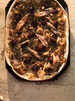 Oriental onion cake with anchovies and olives