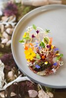 Langoustine and veal fillet tatar, caviar and flowers by Tohru Nakamura from Geisels Werneckhof in Munich