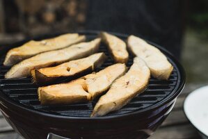 Smoked halibut steaks on a kettle grill