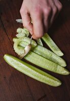Pickling cucumbers being deseeded