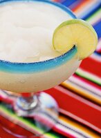 Margarita garnished with a lime wedge