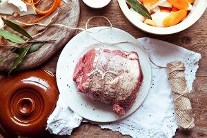 Beef brisket with vegetables and herbs ready to roast