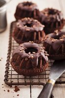 Chocolate Bundt cakes on a wire rack