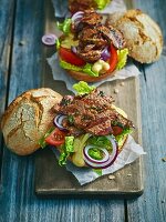 Grilled ox on bread rolls