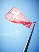 A Swiss cross on a flag, Bernese Oberland, Switzerland