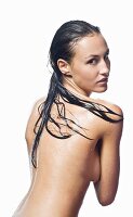 Topless woman with wet hair