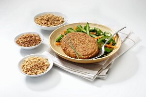 A vegetarian steak with salad and ingredients