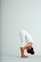 Forwards bend - Step 1: bring your upper body forward, breast on upper leg (power yoga)