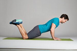 A simple push up – Step 1: support yourself on your knees