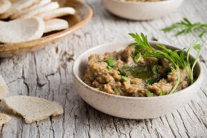 Spicy lentil sip with parsley and lemon with crackers